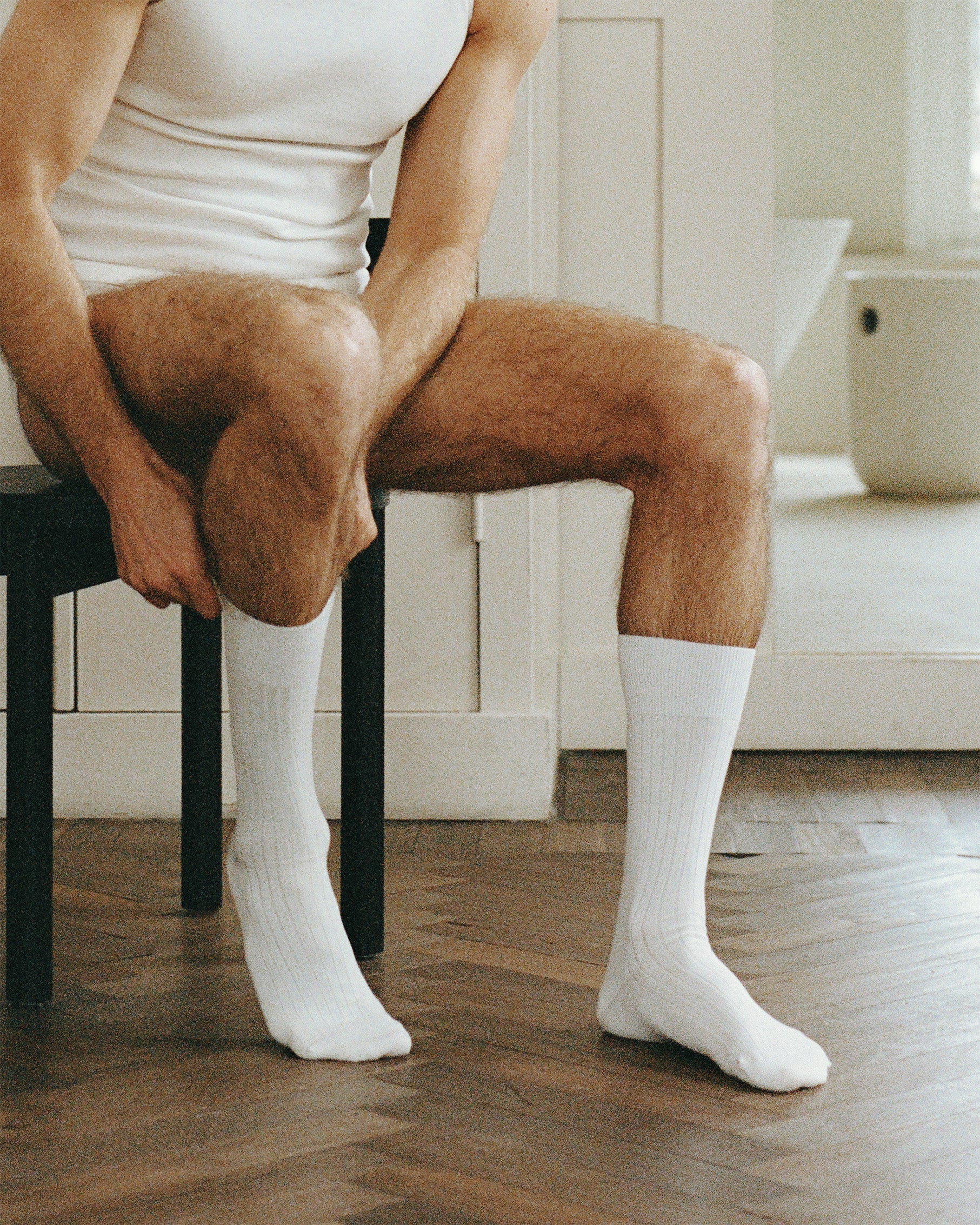Men wearing mid calf white cotton socks